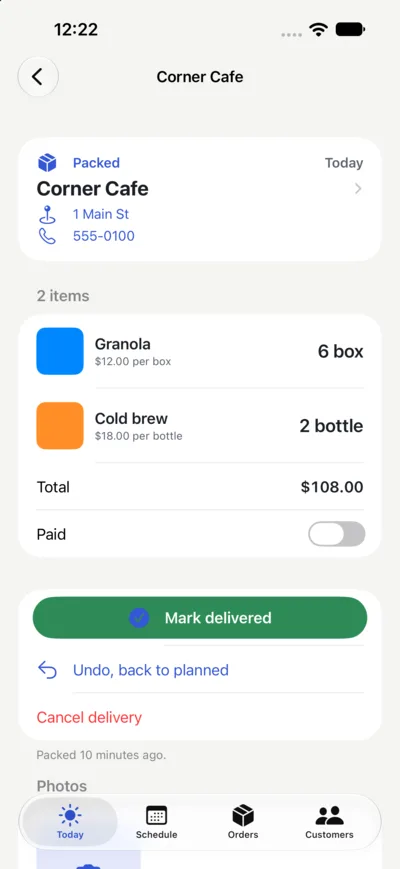 Delivery detail for Corner Cafe: packed, two products and a Mark delivered button